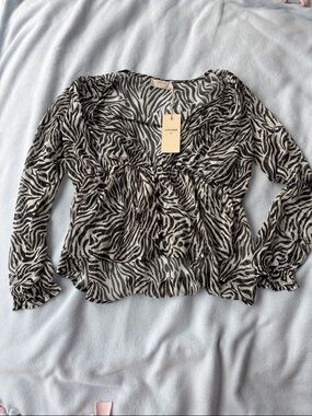 Cream Zebra-Print Long Sleeve Peplum Blouse